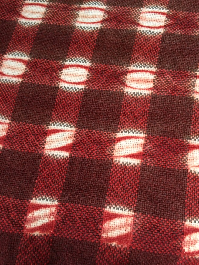 Alpaca, woven shibori resist, dyed with madder (rubia tinctoria), inspired by  check patterned textile from China and Mexico
